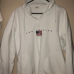 cinching white quarter zip